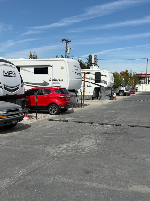RVs parked along the gravel sites at High Desert RV Park